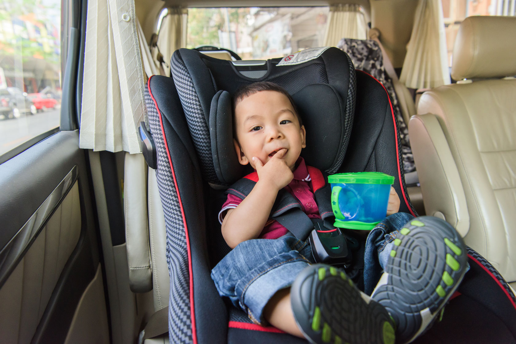adorable-baby-boy-safety-car-seat-384594415