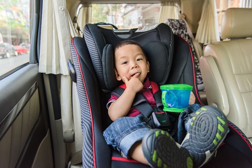 adorable-baby-boy-safety-car-seat-384594415