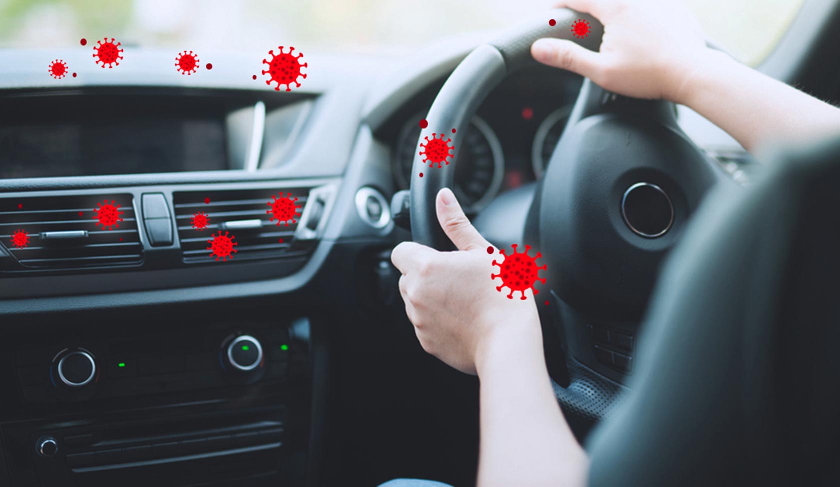 Holding a steering wheel, unaware of the viruses and bacteria that may be on it