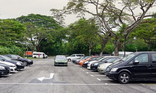 Cars parked properly in designated parking lots in Singapore